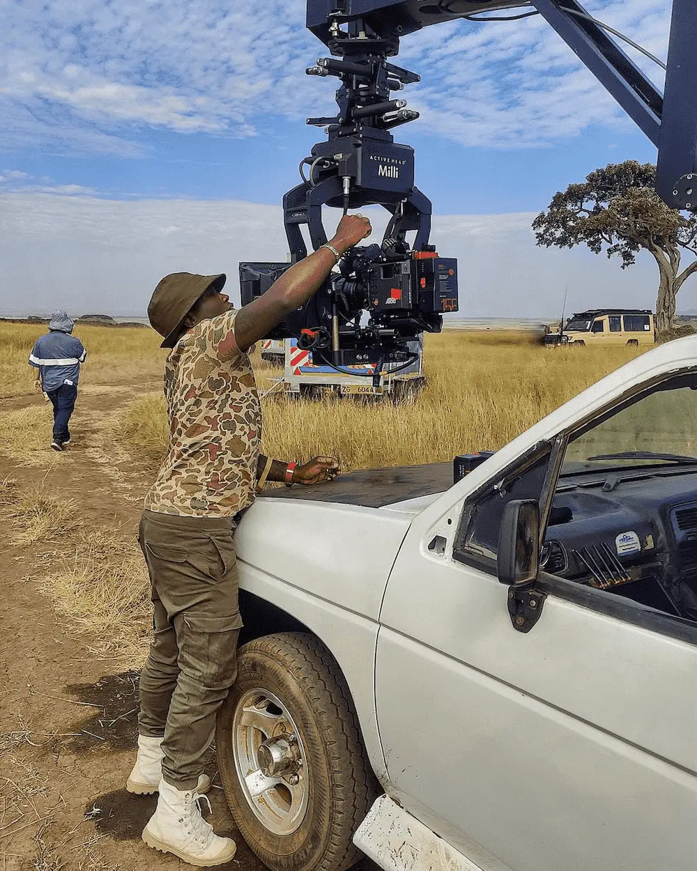 1st AC preparing camera for low-light scene